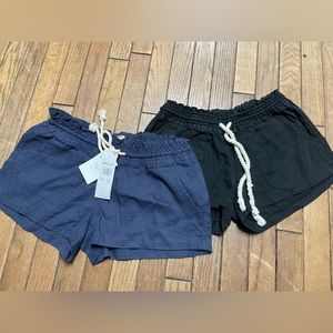 Bundle. Blue and black Oceanside Roxy shorts. One still has tags on it.